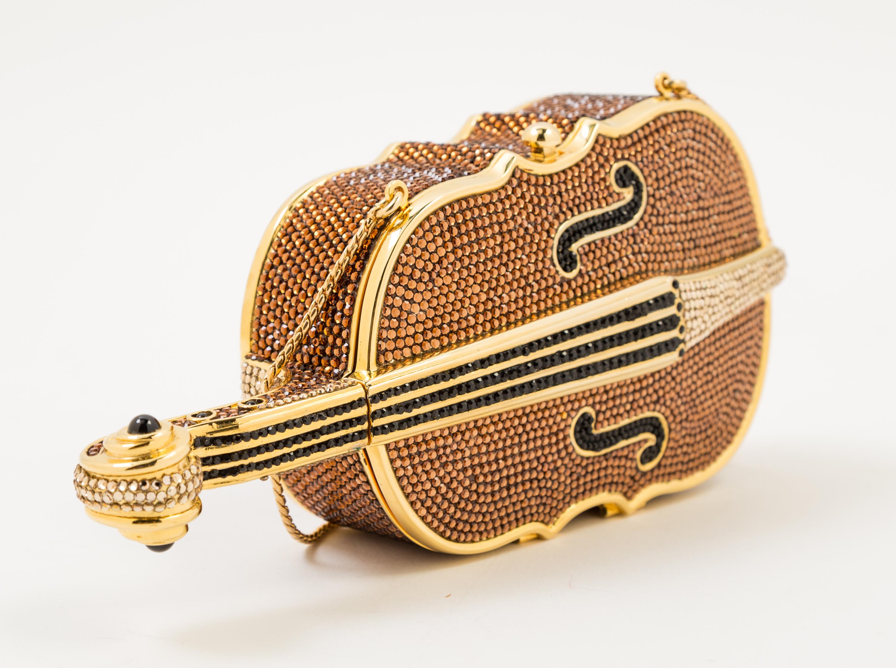 A Judith Leiber Crystal Cello Minaudiere, 3.5" x 7.5" x 1.5".
