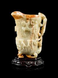 A Russet and Pale Celadon Jade 'Chilong' Rhyton Cup