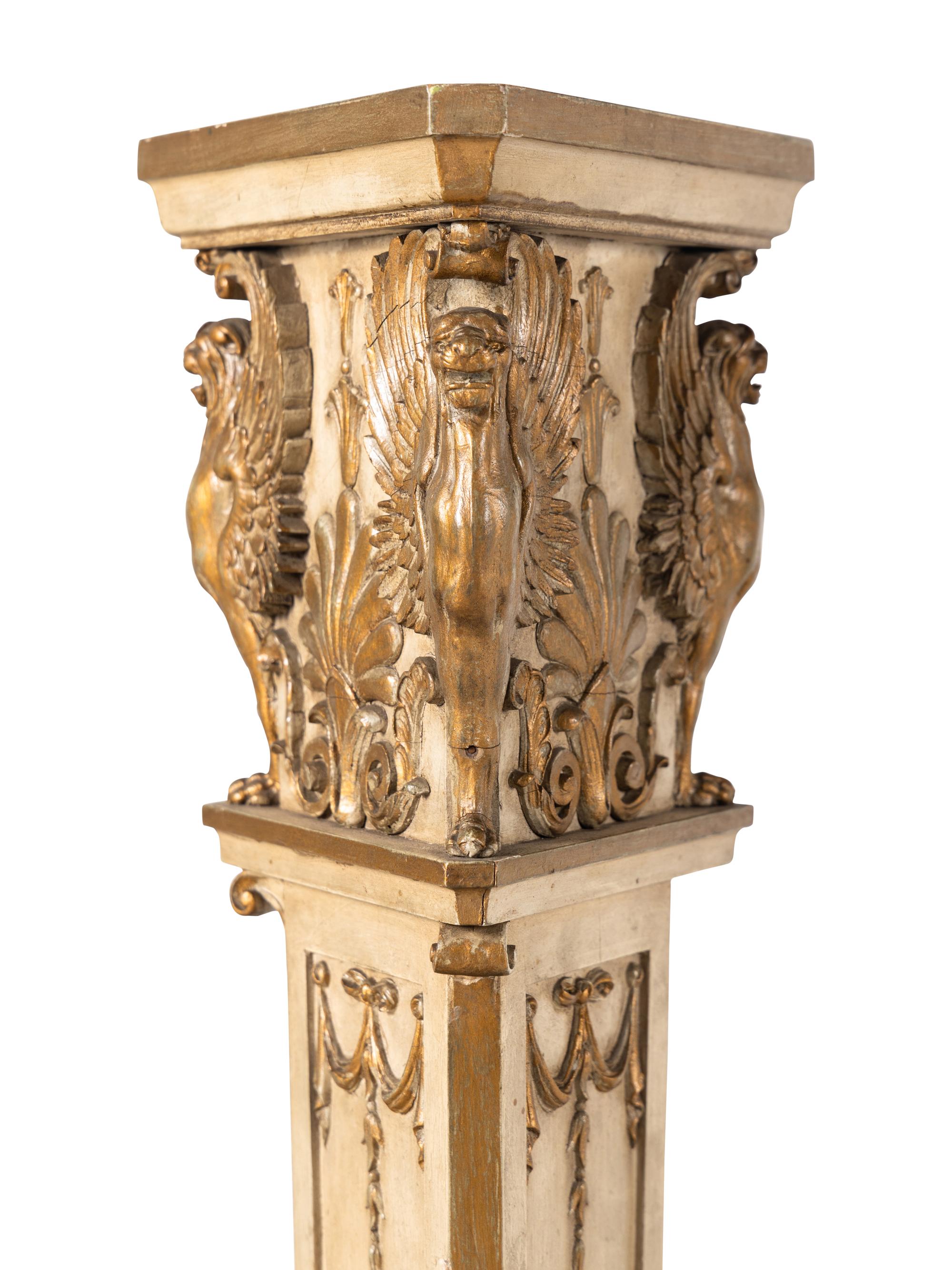 A Pair of Empire Style Painted Torchères