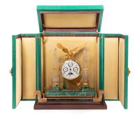A Swiss Gilt Metal, Rock Crystal and Malachite Veneered Desk Clock, Mouawad Height 13 inches. — MODERN