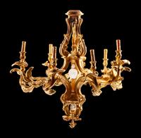 A Louis XV Style Giltwood Nine-Light Chandelier