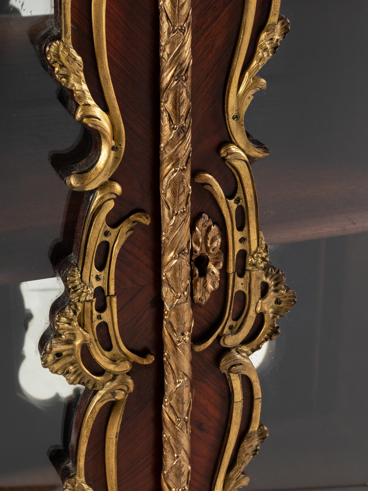 A Louis XV Style Gilt Bronze Mounted Kingwood Bookcase