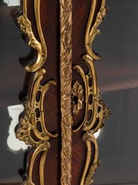 A Louis XV Style Gilt Bronze Mounted Kingwood Bookcase