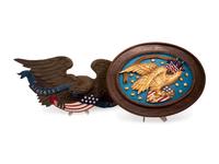 A Carved and Painted Eagle and a Carved, Painted and Parcel Gilt Eagle Plaque