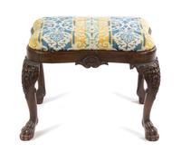 An English Carved Mahogany Ottoman Width 26 inches. — EARLY 20TH CENTURY