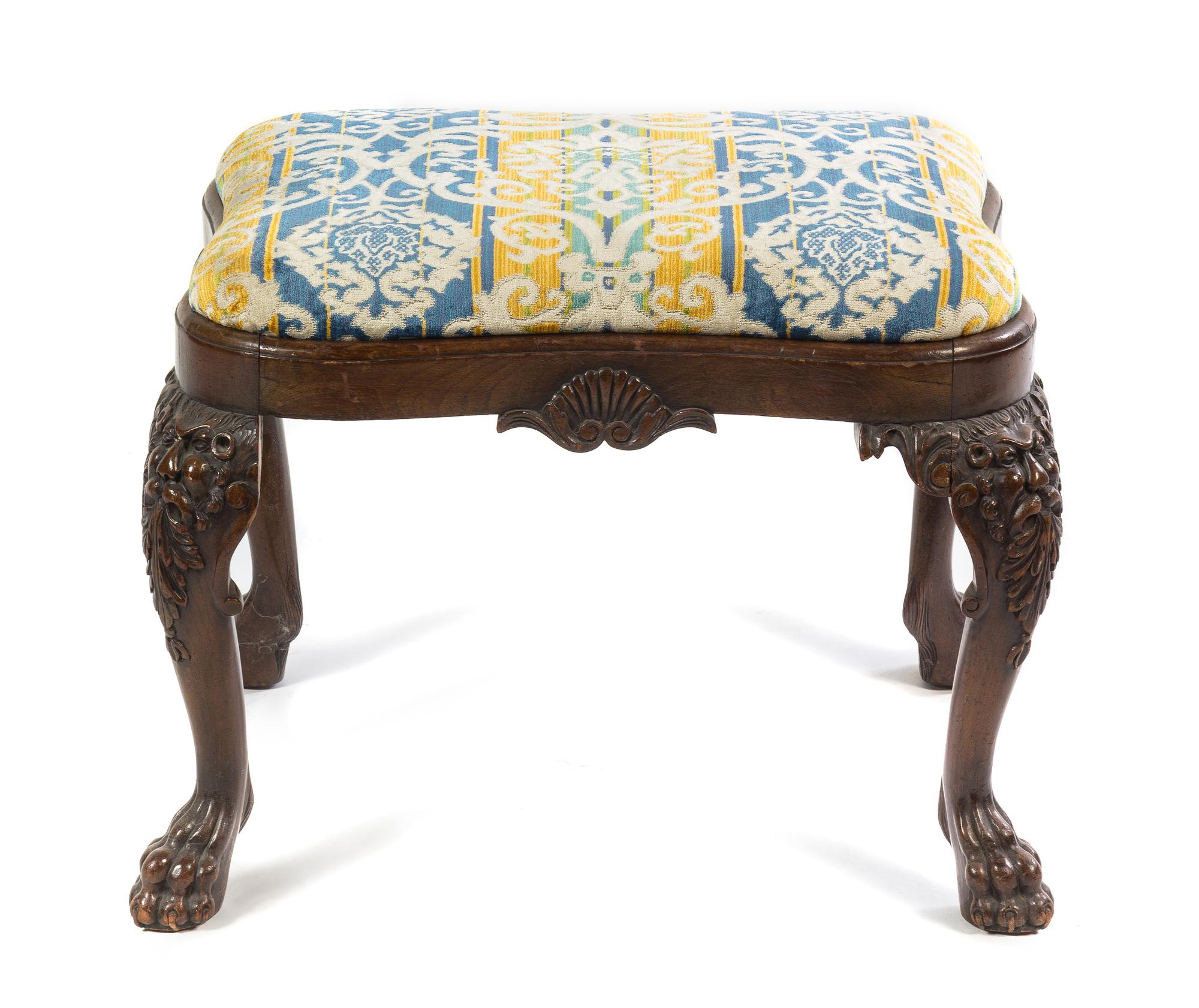 An English Carved Mahogany Ottoman Width 26 inches. — EARLY 20TH CENTURY