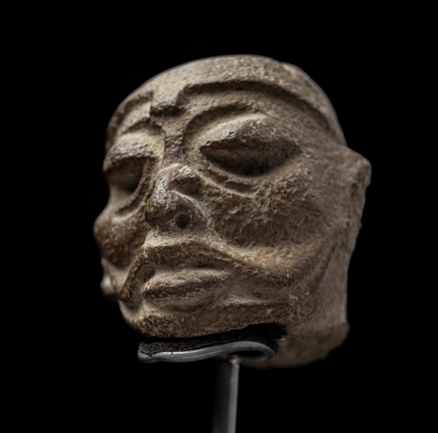 A Maya Terracotta Head from a Figural Vessel