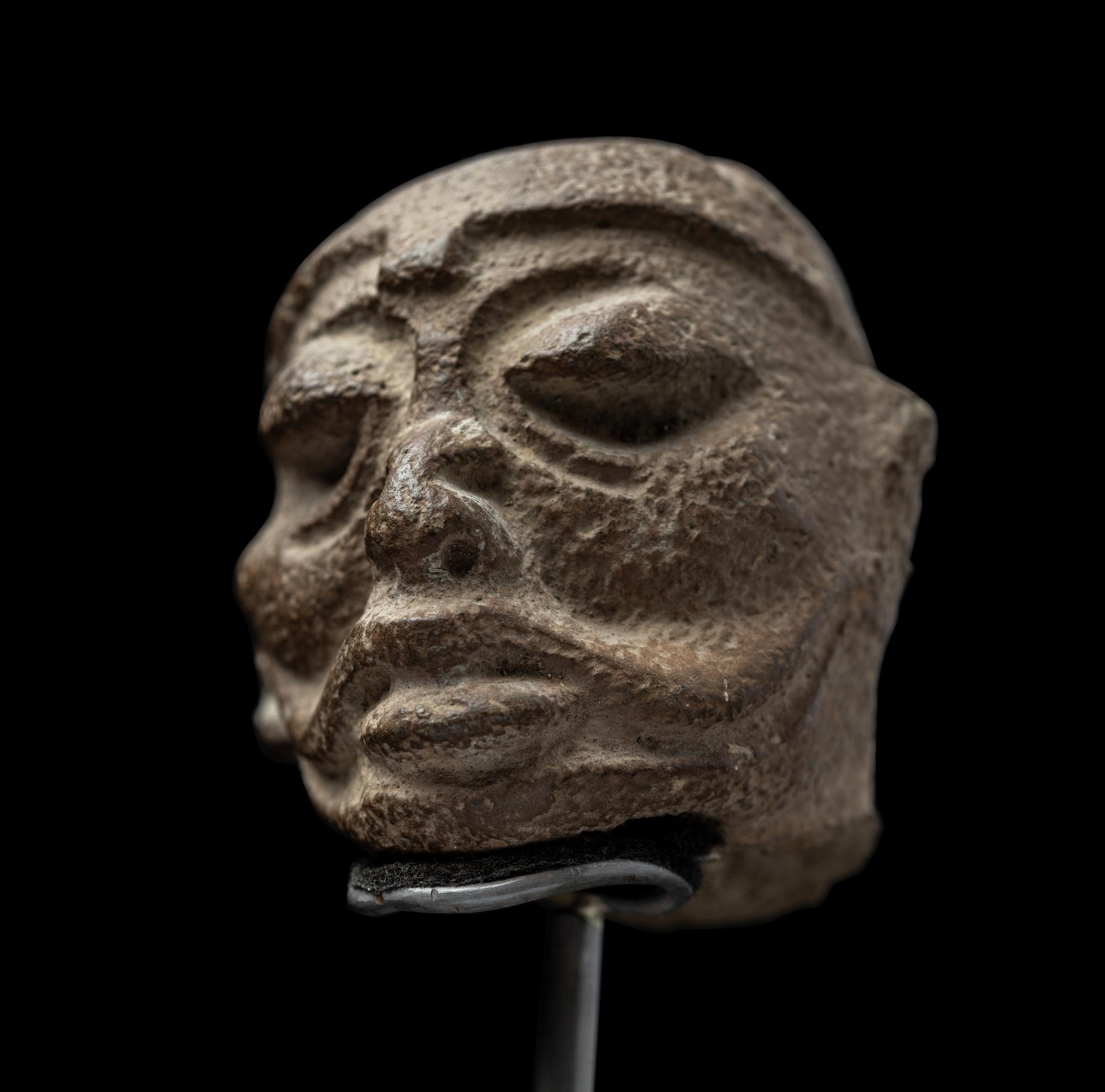 A Maya Terracotta Head from a Figural Vessel