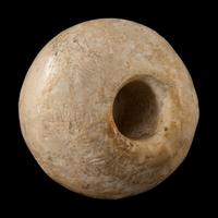 An Egyptian Limestone Mace Head