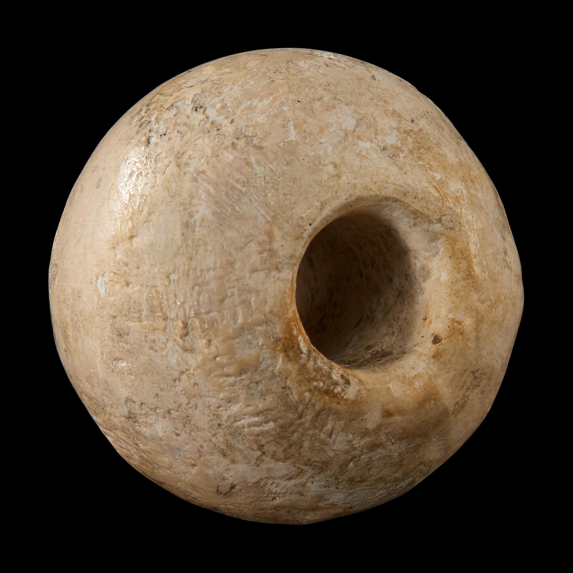 An Egyptian Limestone Mace Head