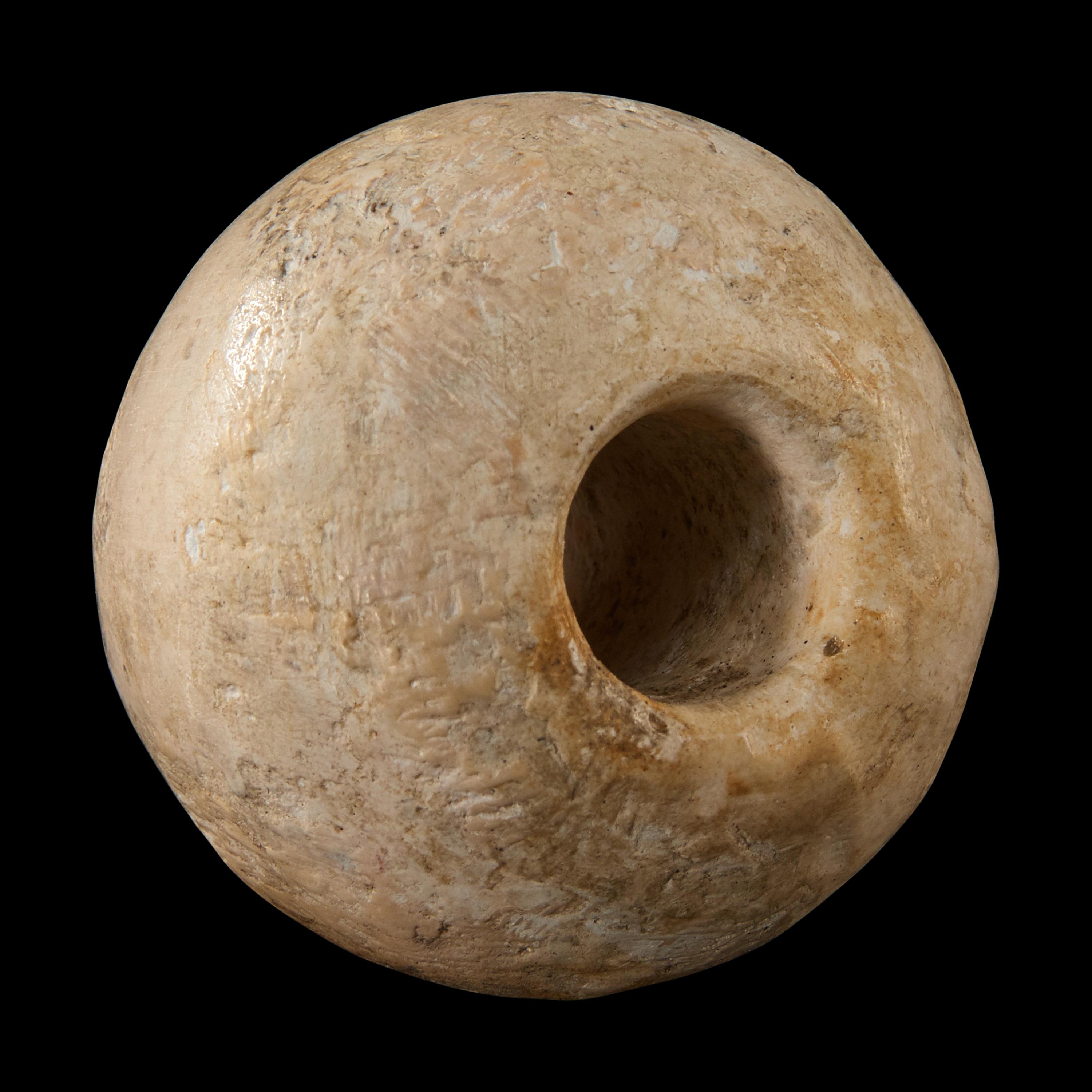 An Egyptian Limestone Mace Head