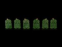 Twenty-One Chinese Spinach Jade Pendants