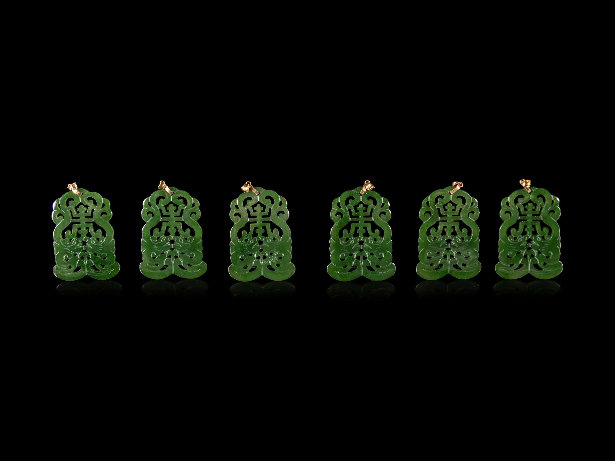 Twenty-One Chinese Spinach Jade Pendants