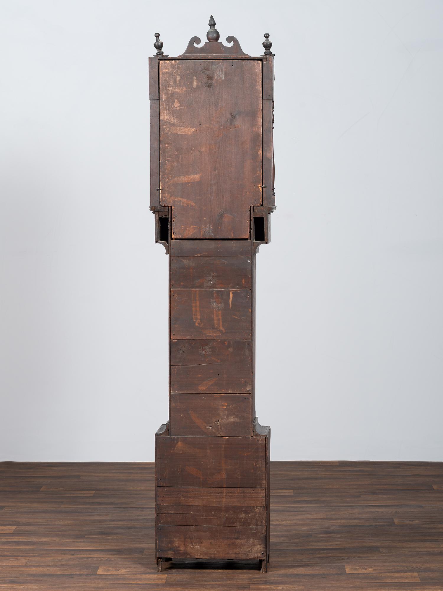A Chippendale Cherrywood and Tiger Maple Tall Case Clock