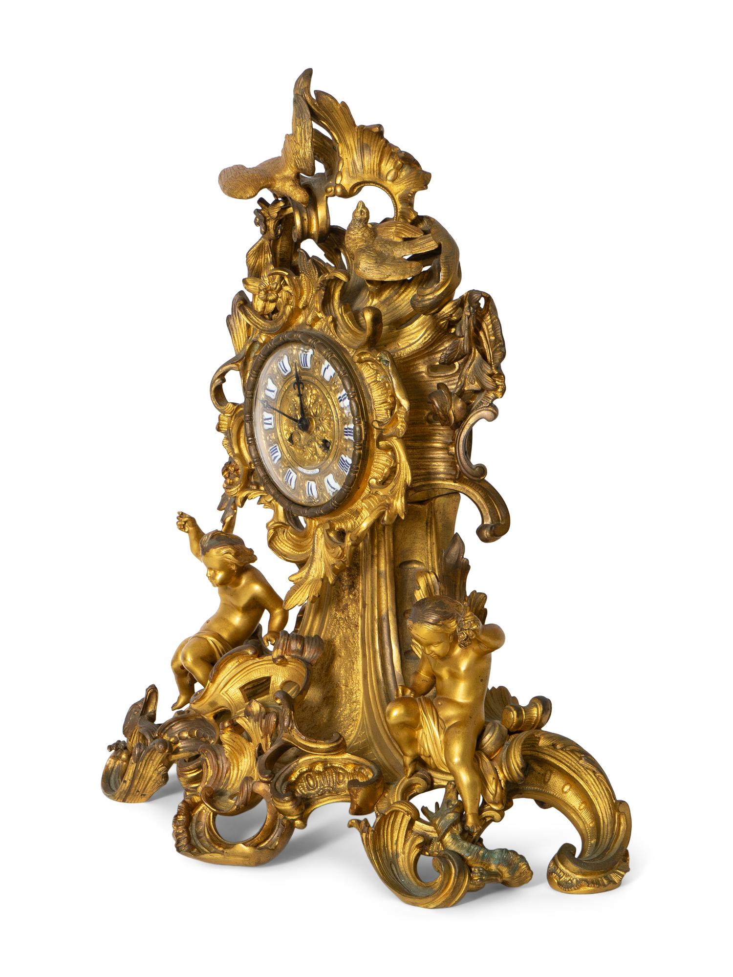 A French Rococo Style Gilt Bronze Mantel Clock
