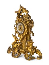 A French Rococo Style Gilt Bronze Mantel Clock