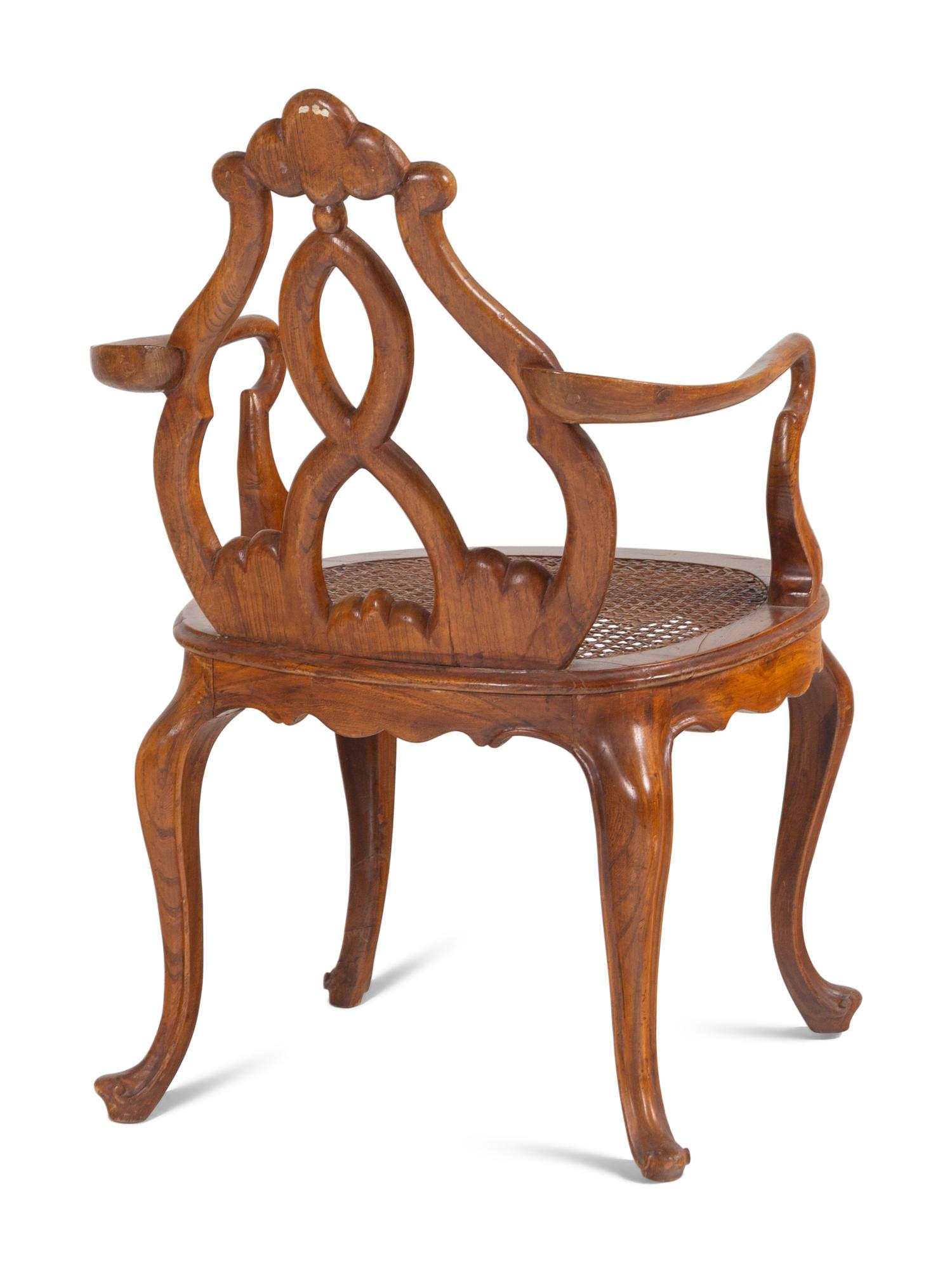 An English Caned Walnut Armchair