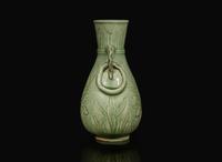 A Chinese celadon-glazed peony-incised vase, Ming to Qing dynasty 青釉刻劃牡丹瓶 明或清