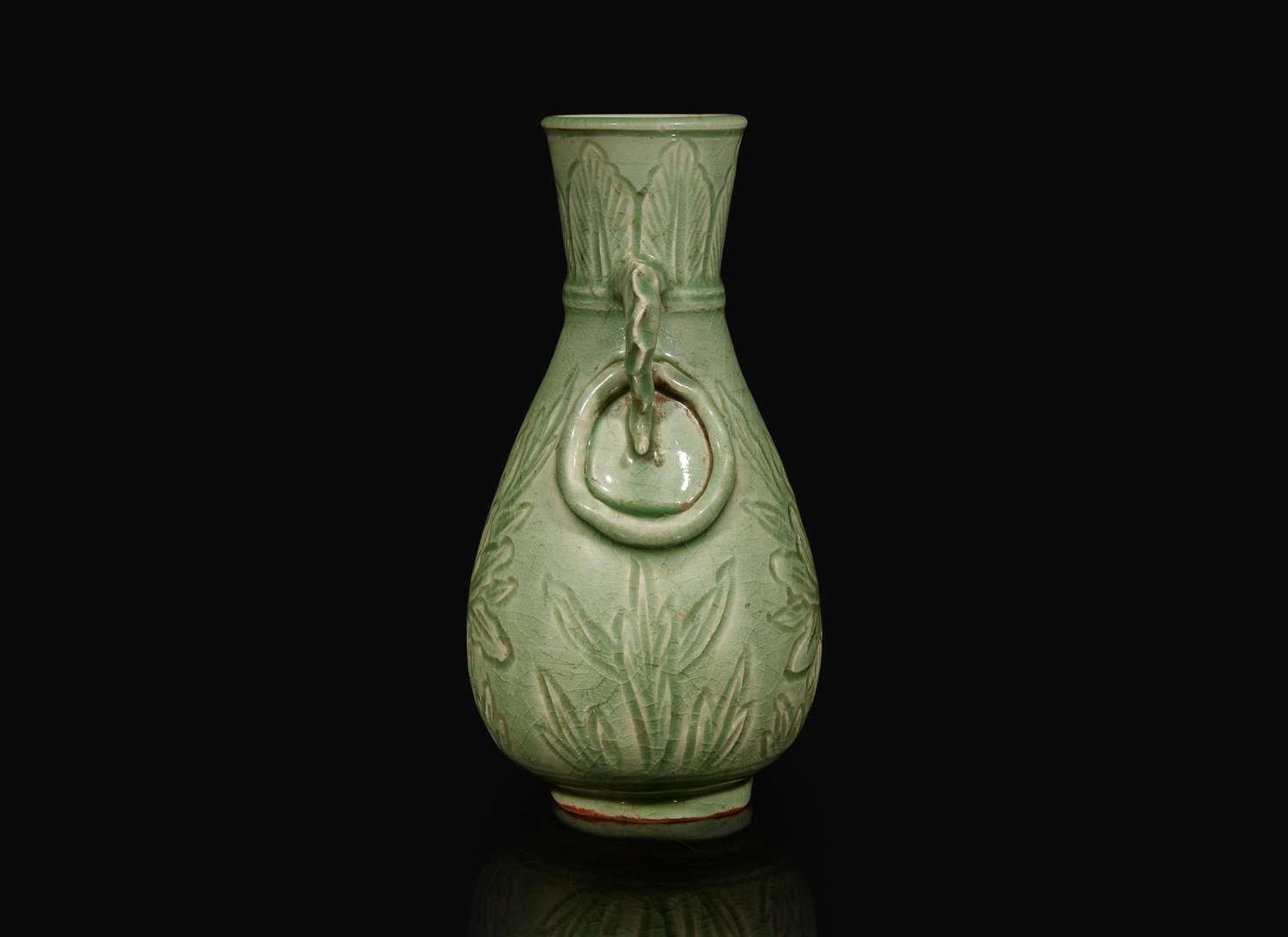A Chinese celadon-glazed peony-incised vase, Ming to Qing dynasty 青釉刻劃牡丹瓶 明或清