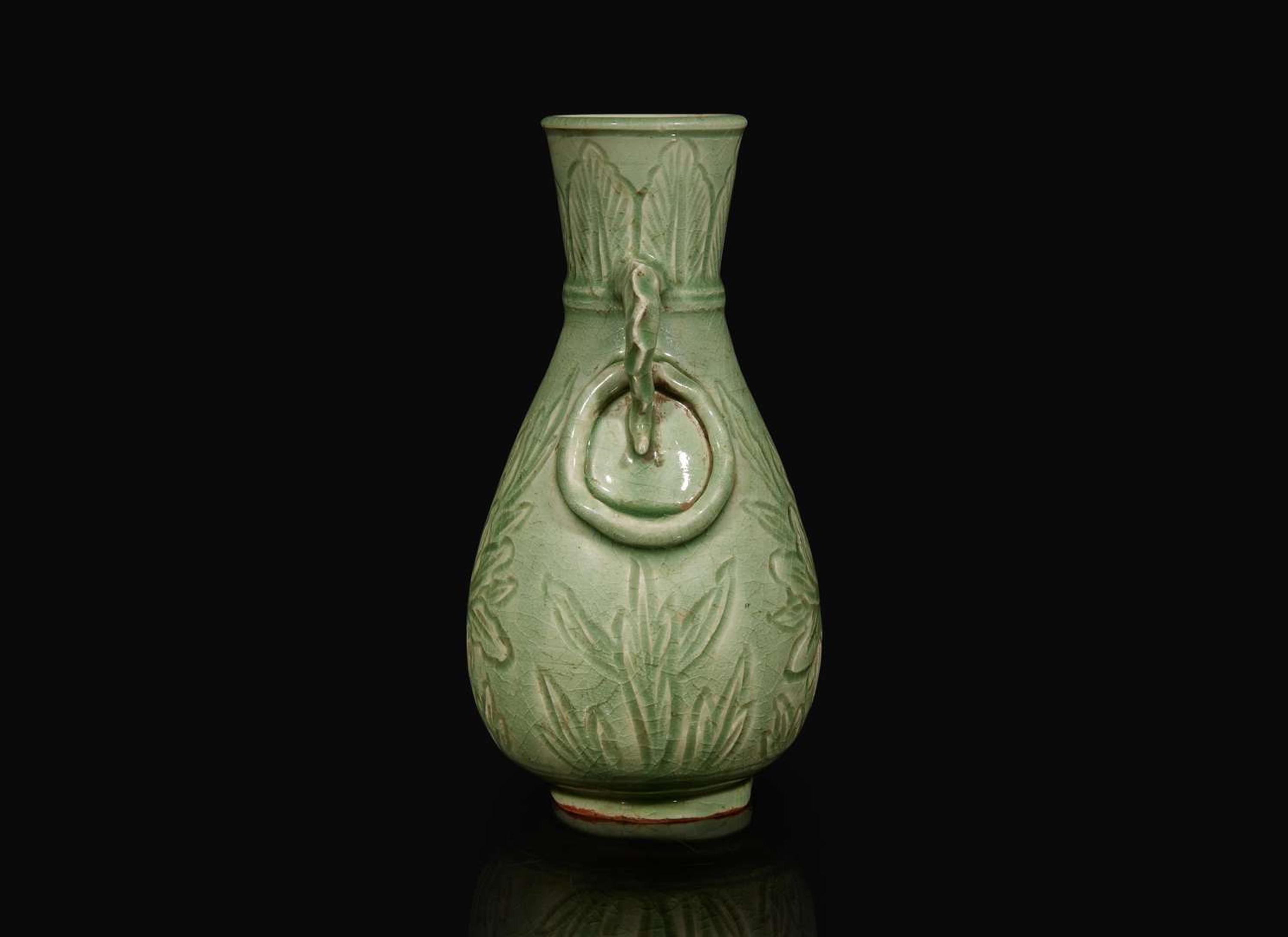 A Chinese celadon-glazed peony-incised vase, Ming to Qing dynasty 青釉刻劃牡丹瓶 明或清