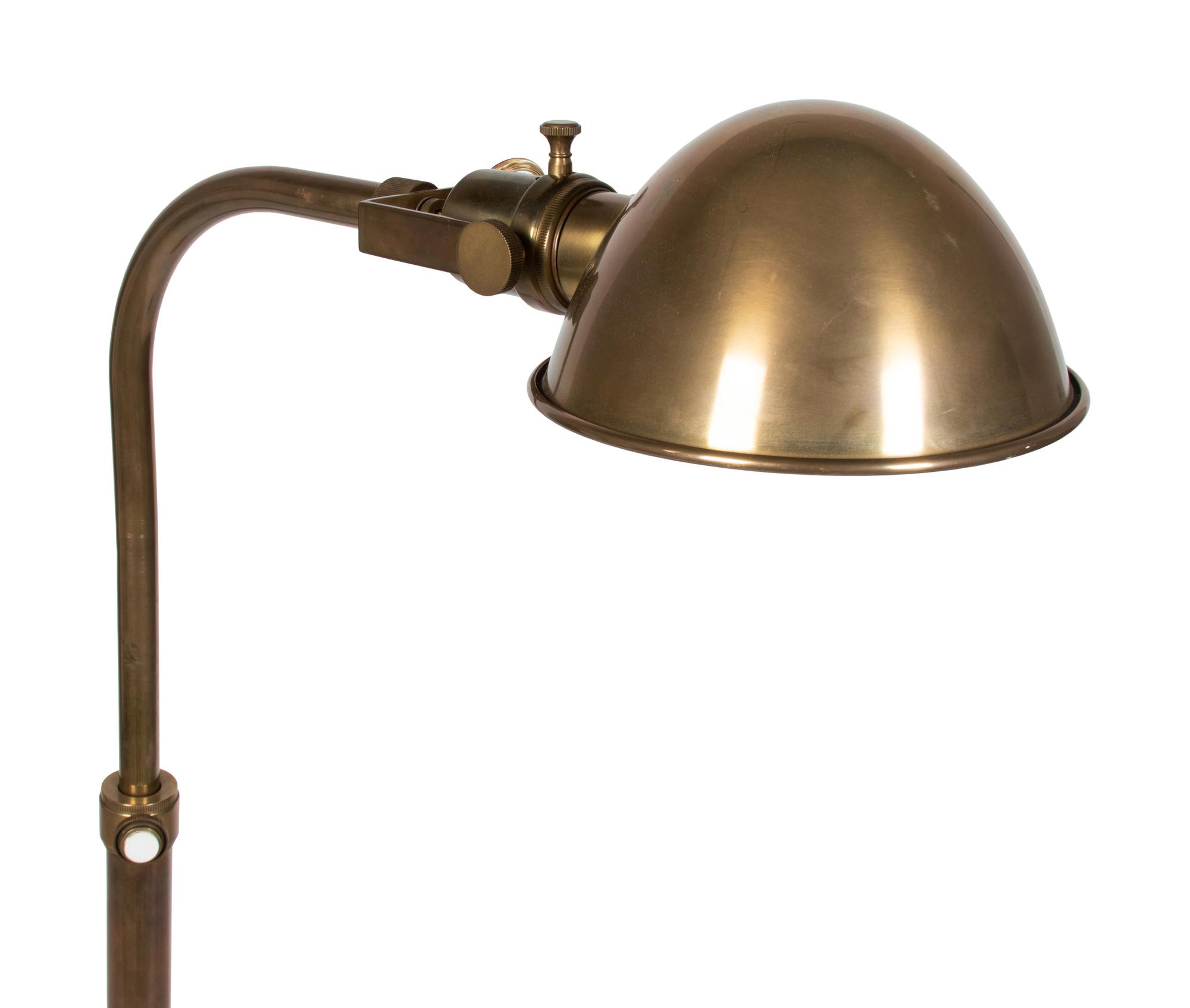 A Pair of Brass Floor Lamps