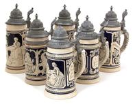 A Collection of Six German Pottery Steins Height 8 1/2 x diameter 3 3/4 inches. — 20TH CENTURY