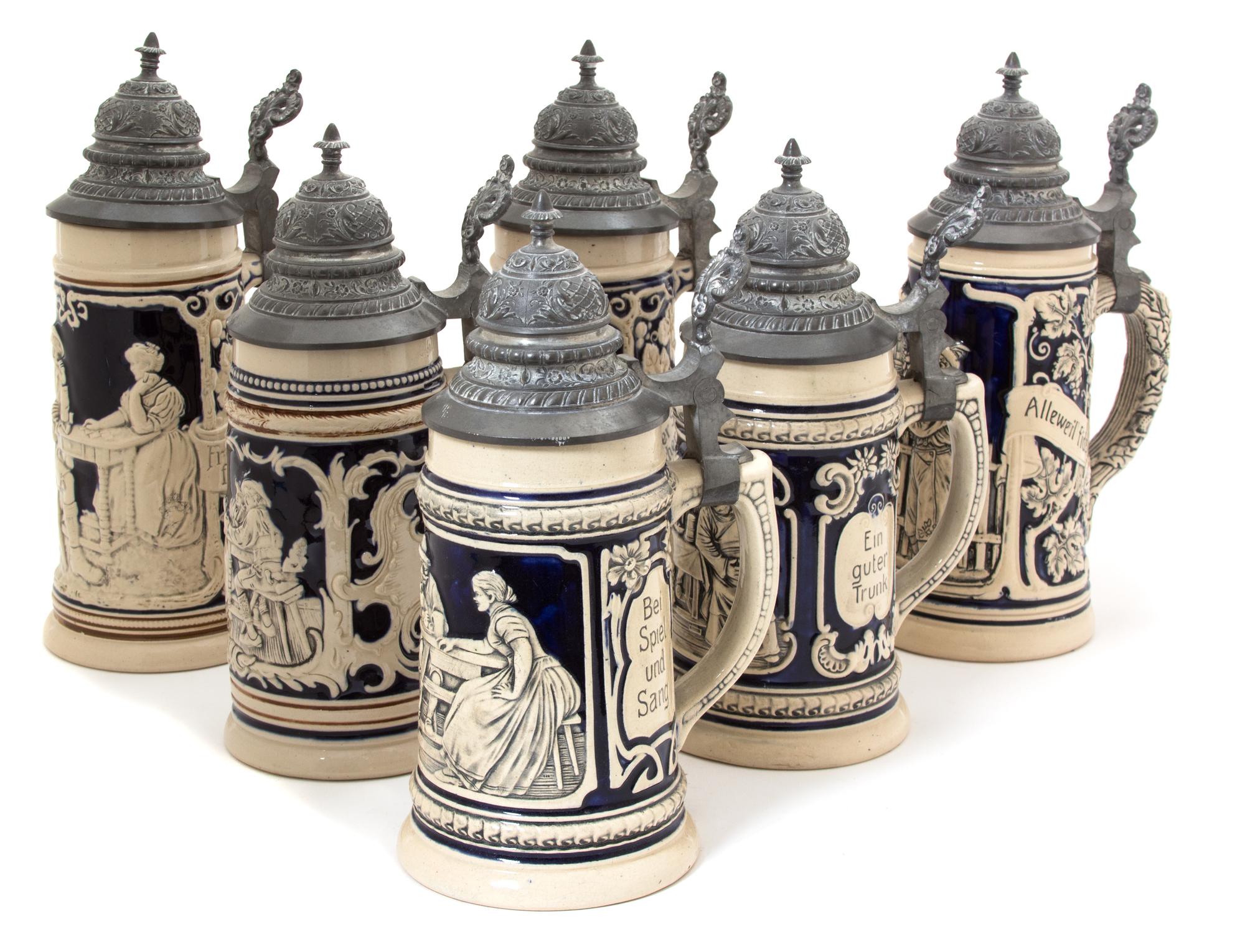 A Collection of Six German Pottery Steins Height 8 1/2 x diameter 3 3/4 inches. — 20TH CENTURY