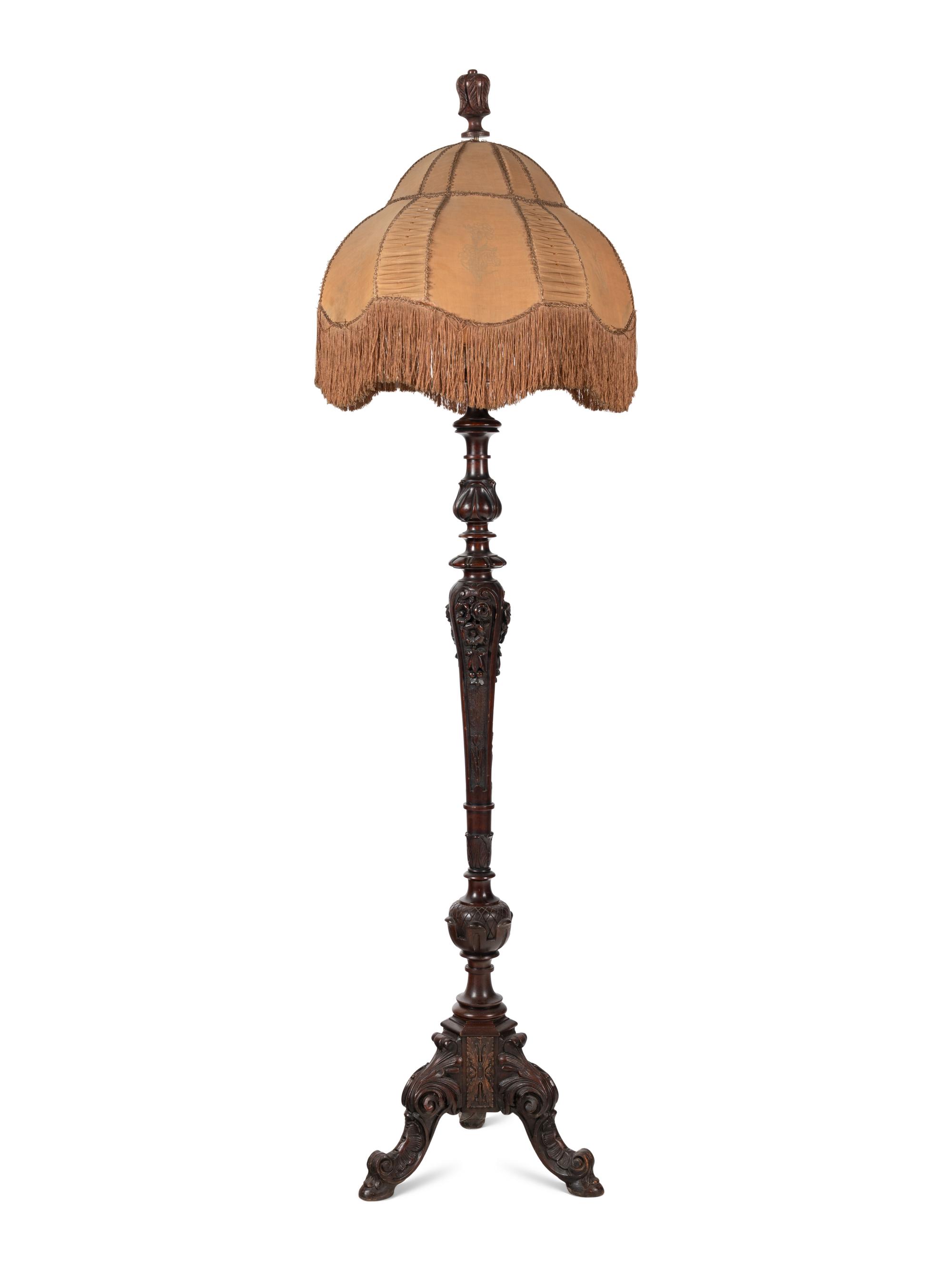 An American Carved Mahogany Floor Lamp
