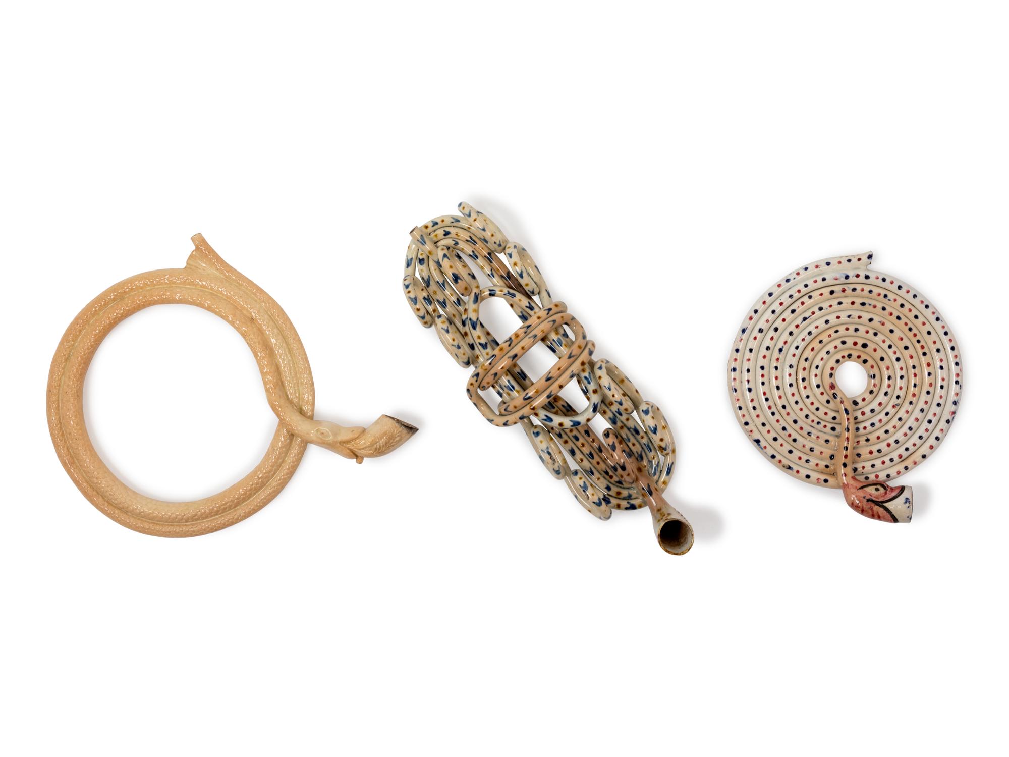 Three Pearlware Coiled Snake Pipes