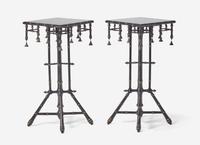 A Pair of American Aesthetic Movement Black-Painted and Parcel Gilt Stands