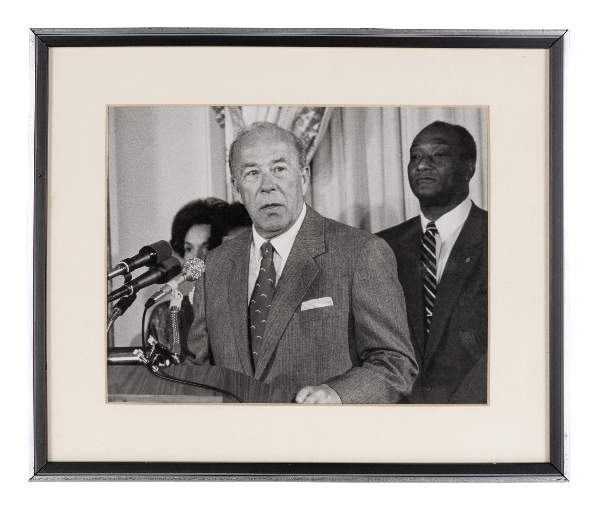 [PERKINS, Edward Joseph (1928-2020)]. A group of 10 photographs in 9 frames, from political figures to Perkins, many signed or inscribed (several presumably with secretarial or facsimile signatures), including: