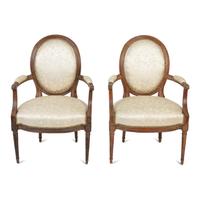A Pair of Louis XVI Walnut Fauteuils en Cabriolet