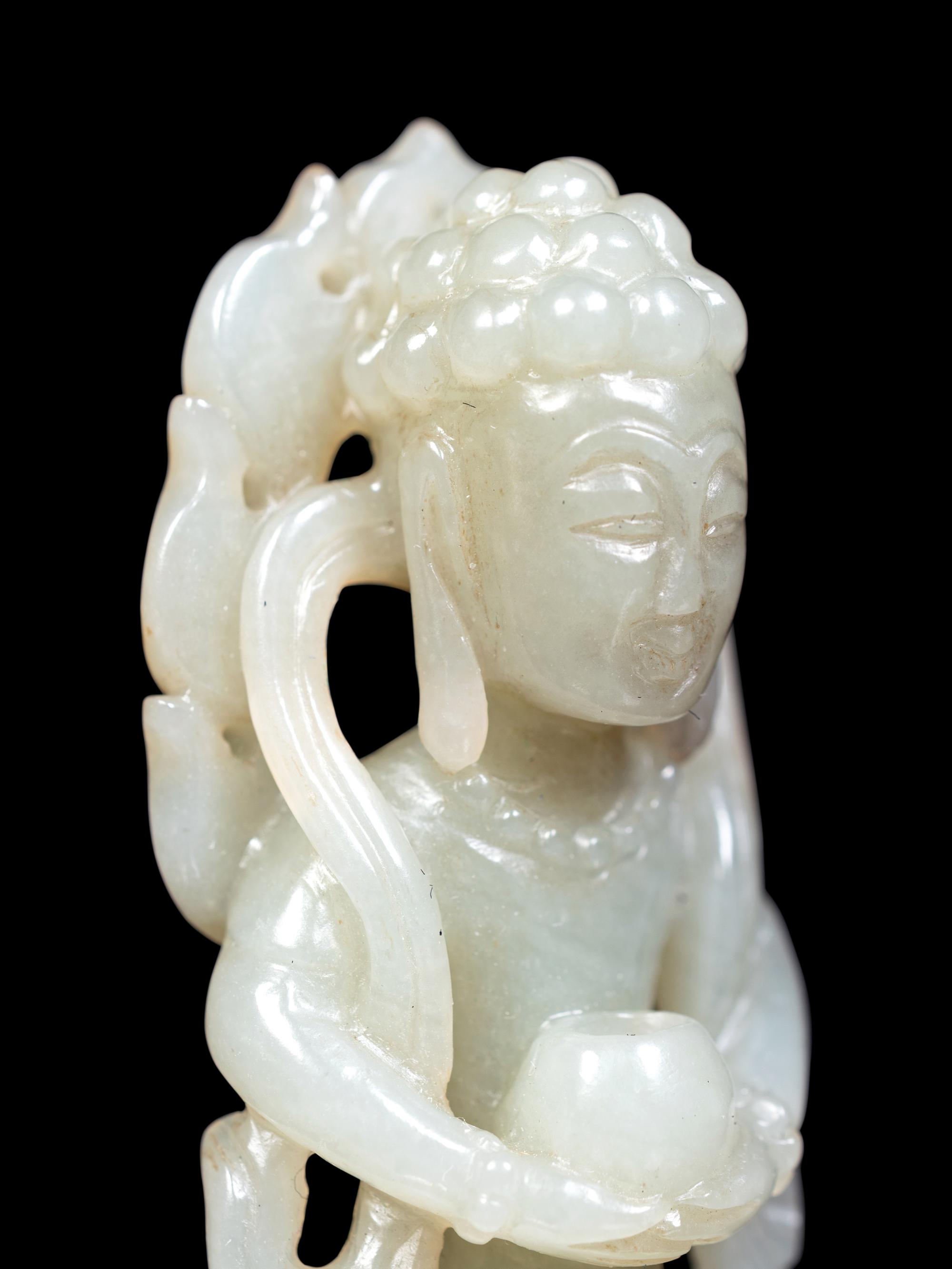 Three Chinese Celadon Jade Carved Figures of Immortals