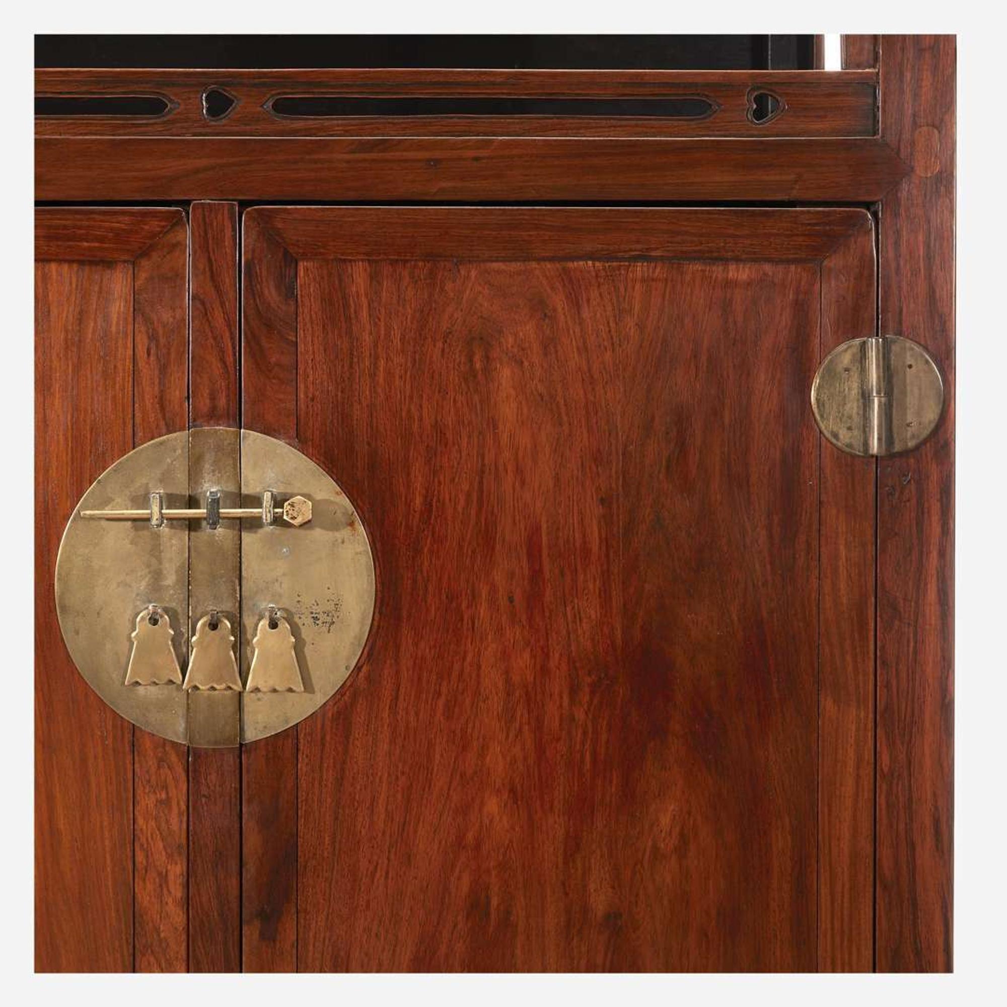 A Chinese Huanghuali and hardwood display cabinet, Lianggegui 19th/20th Century with later alterations