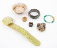 A Group of Seven Archaic Jade Items Length of largest 12 inches.