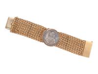 YELLOW GOLD AND ITALIAN PIASTRA COIN BRACELET