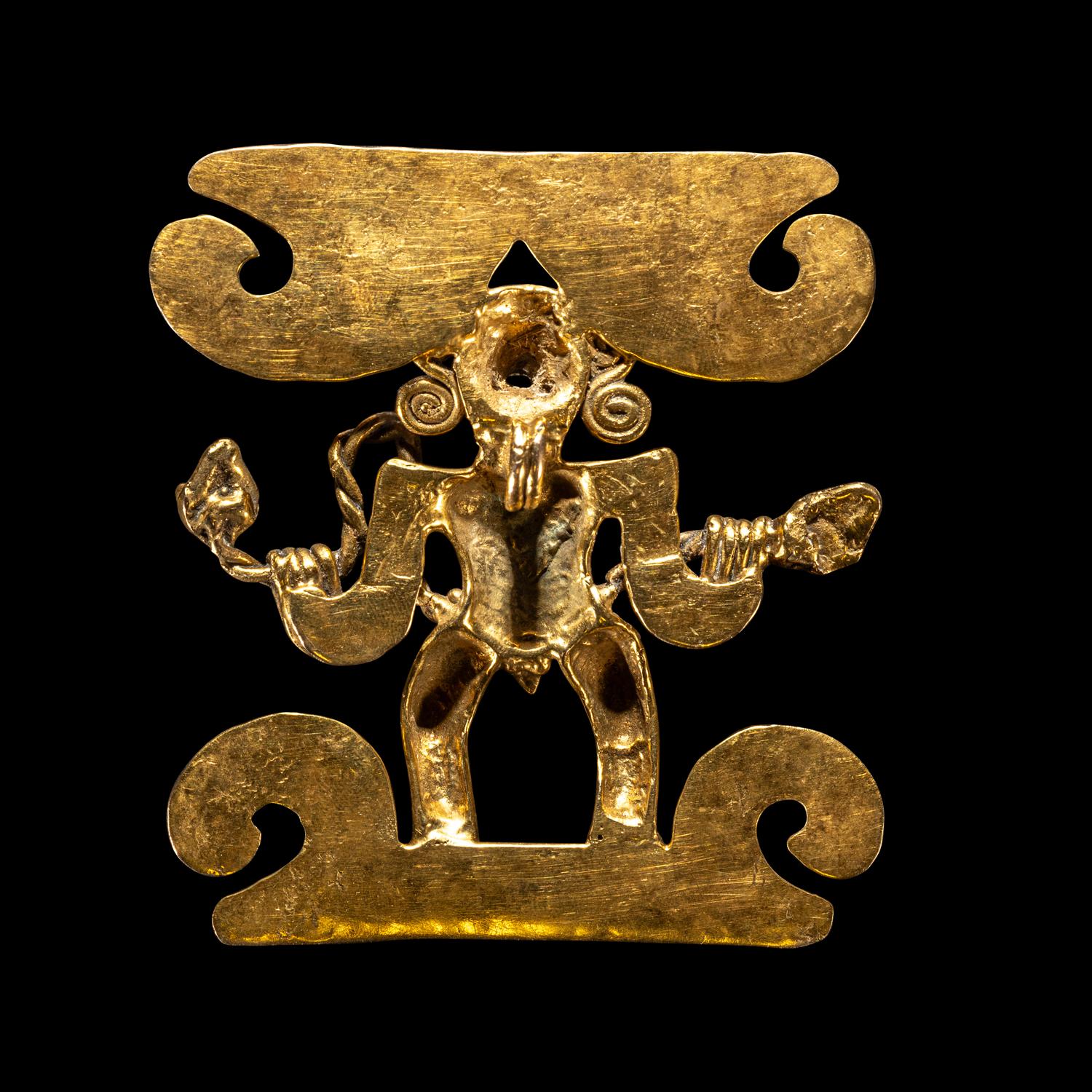 A Veraguas Gold Figural Pendant Holding a Double-Headed Snake