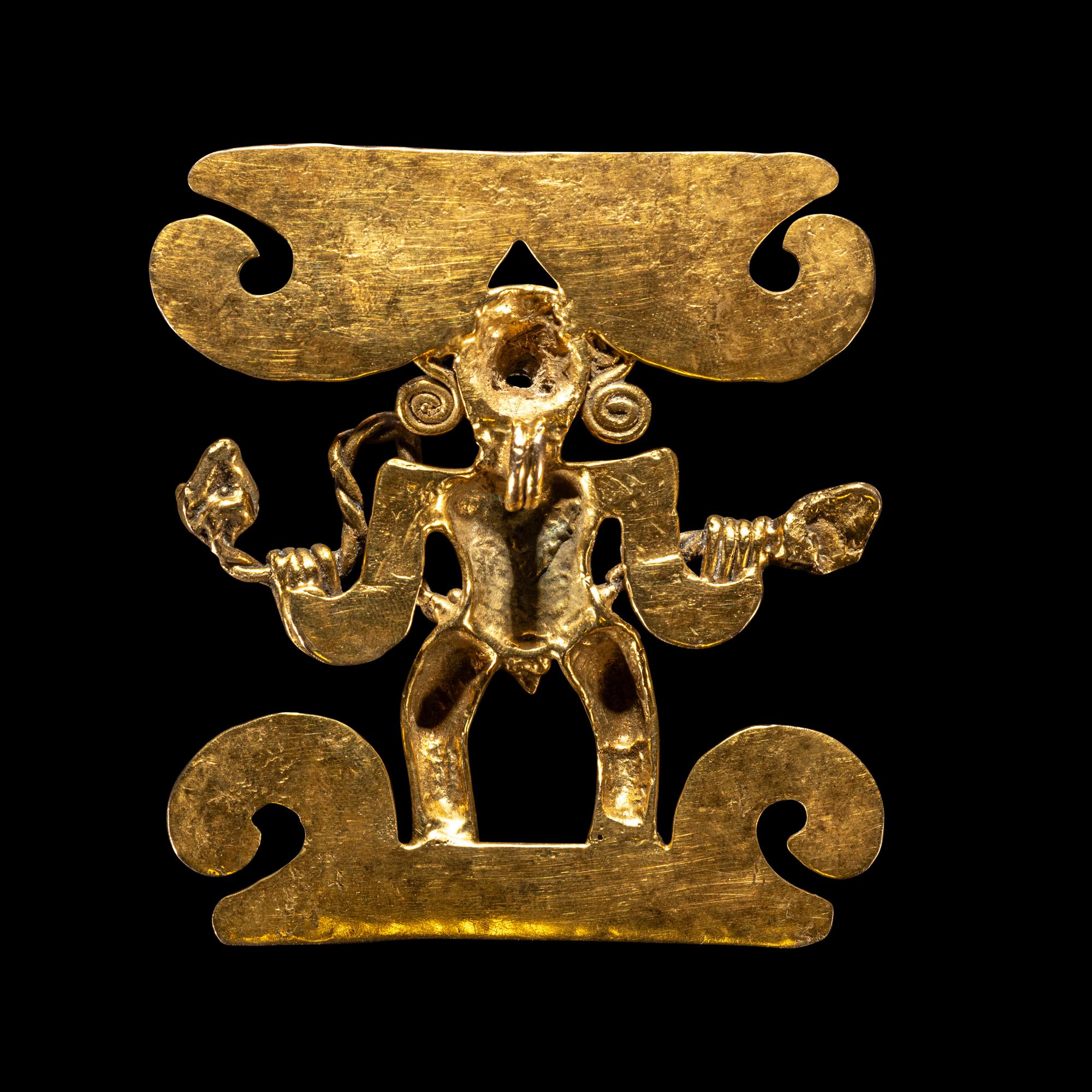 A Veraguas Gold Figural Pendant Holding a Double-Headed Snake