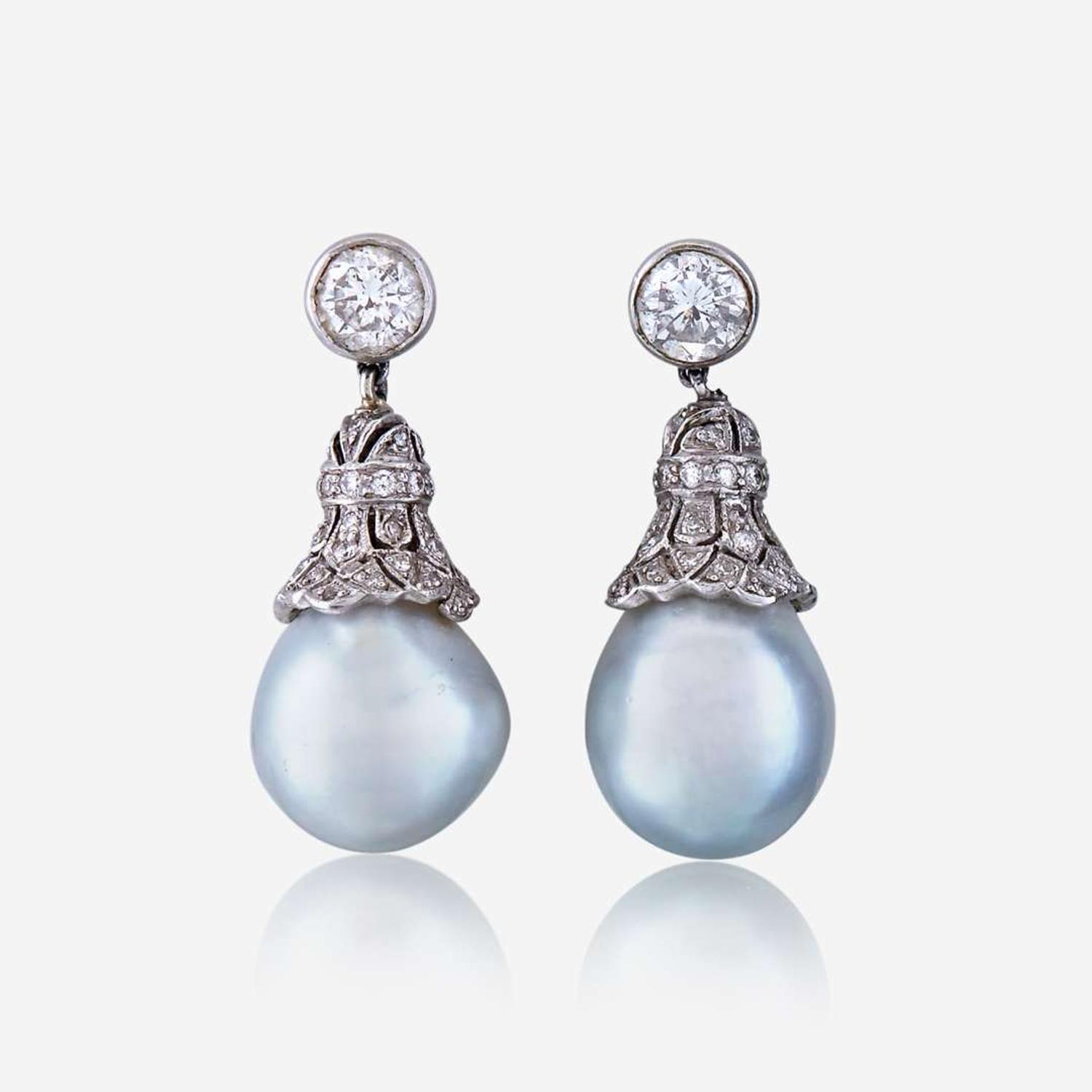 A pair of diamond, cultured pearl, and platinum earrings