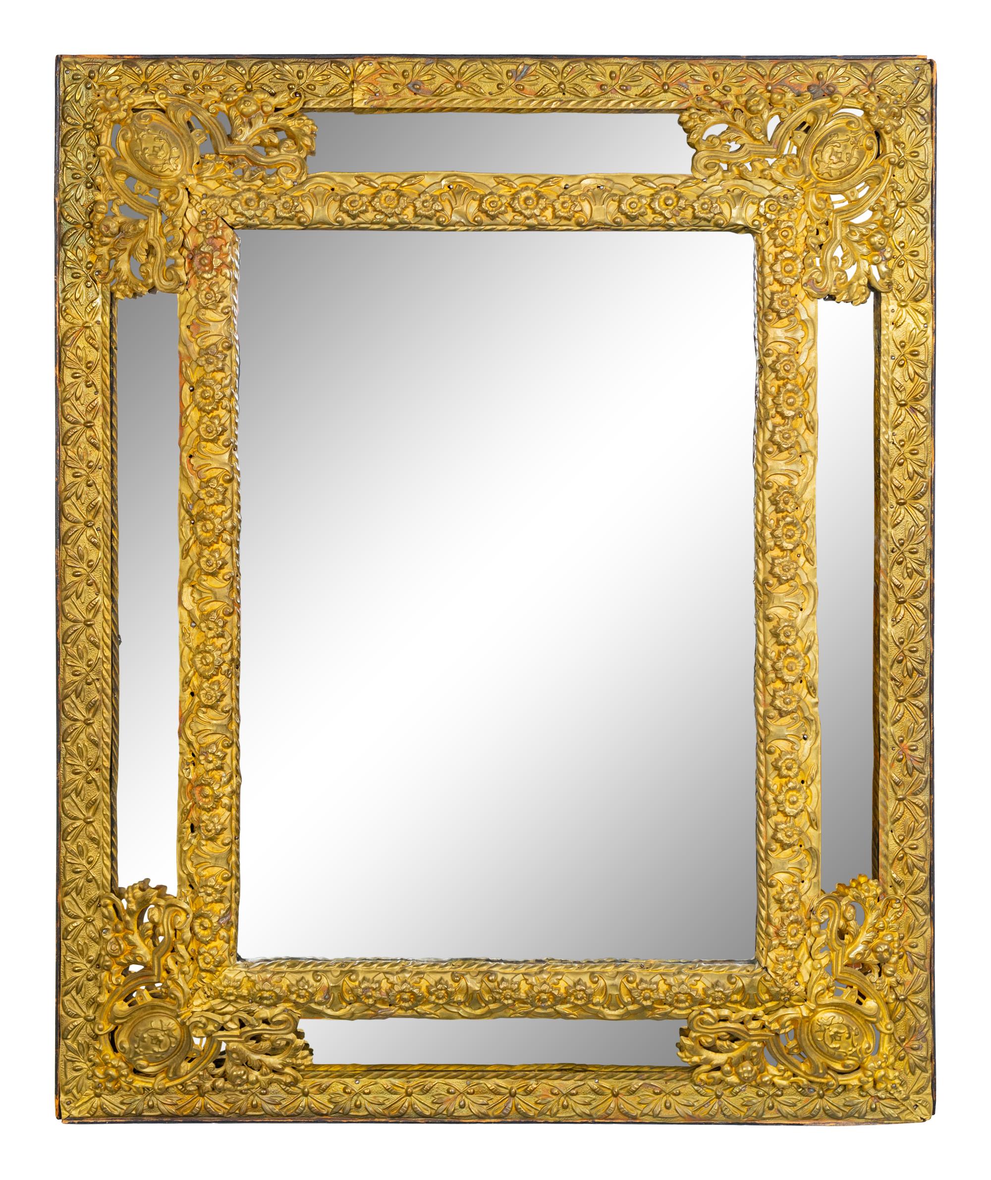 A Dutch Baroque Style Brass Repousse Mirror