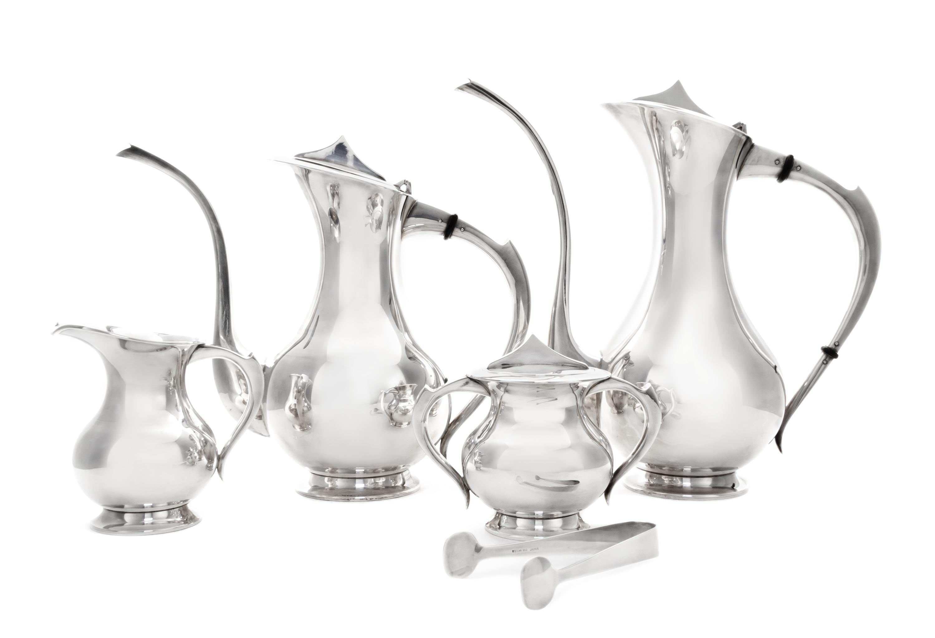 A Japanese Export Silver Four-Piece Tea and Coffee Service, 20th Century, comprising a teapot, a coffee pot, a creamer and a two-handle