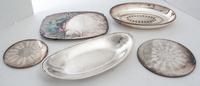 A Collection of Silver-Plate Serving Articles and Parts Width of first 9 3/4 inches.