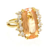 An 18 Karat Yellow Gold, Topaz and Diamond Ring, 6.20 dwts.