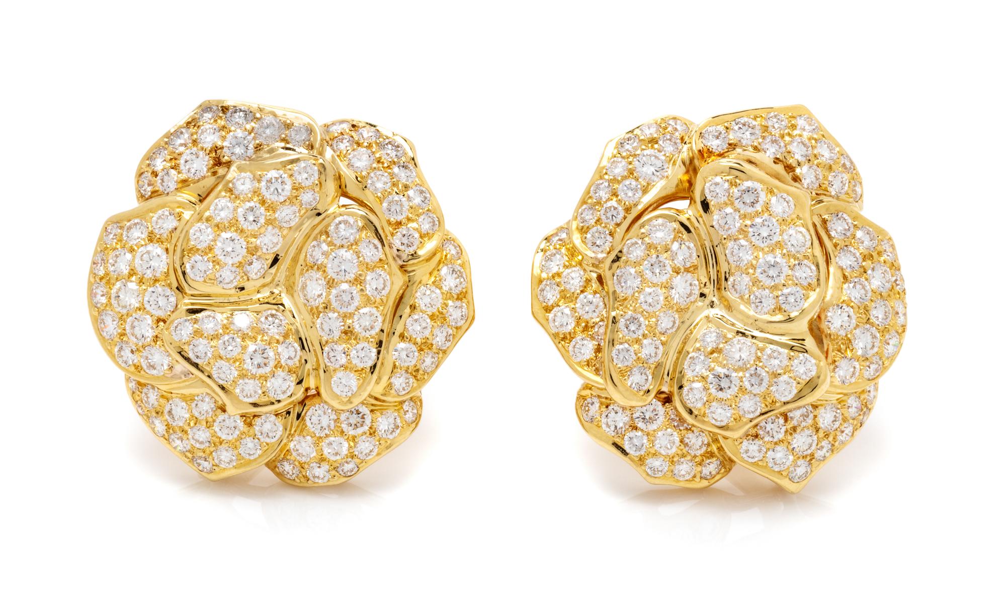 A Pair of 18 Karat Yellow Gold and Diamond Flower Earclips, 17.90 dwts.