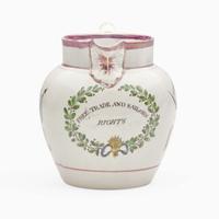 A small Staffordshire enamel and transfer-decorated pearlware jug England, early 19th century
