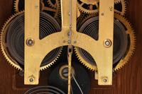 An Ansonia Cabinet A Brass Mounted Oak Shelf Clock