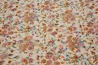 A Machine-Made Wool Floral Design Rug