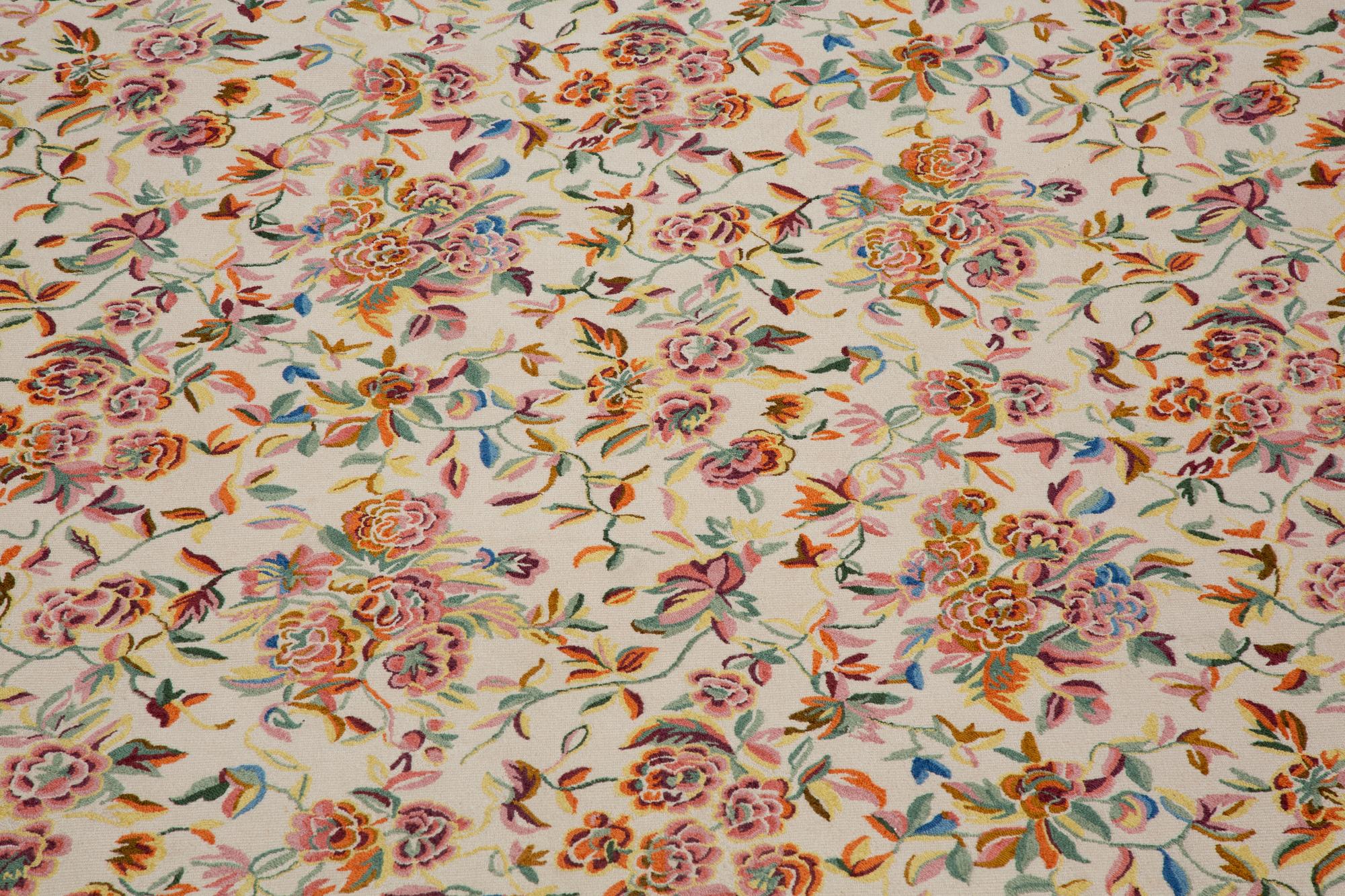 A Machine-Made Wool Floral Design Rug