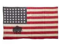 [BUFFALO SOLDIERS] -- [SPANISH AMERICAN WAR]. Sergeant Major George D. Powell, Co. C, 24th US Infantry, archive incl. Buffalo Soldiers' parade flag, identified wooden box and personal items.