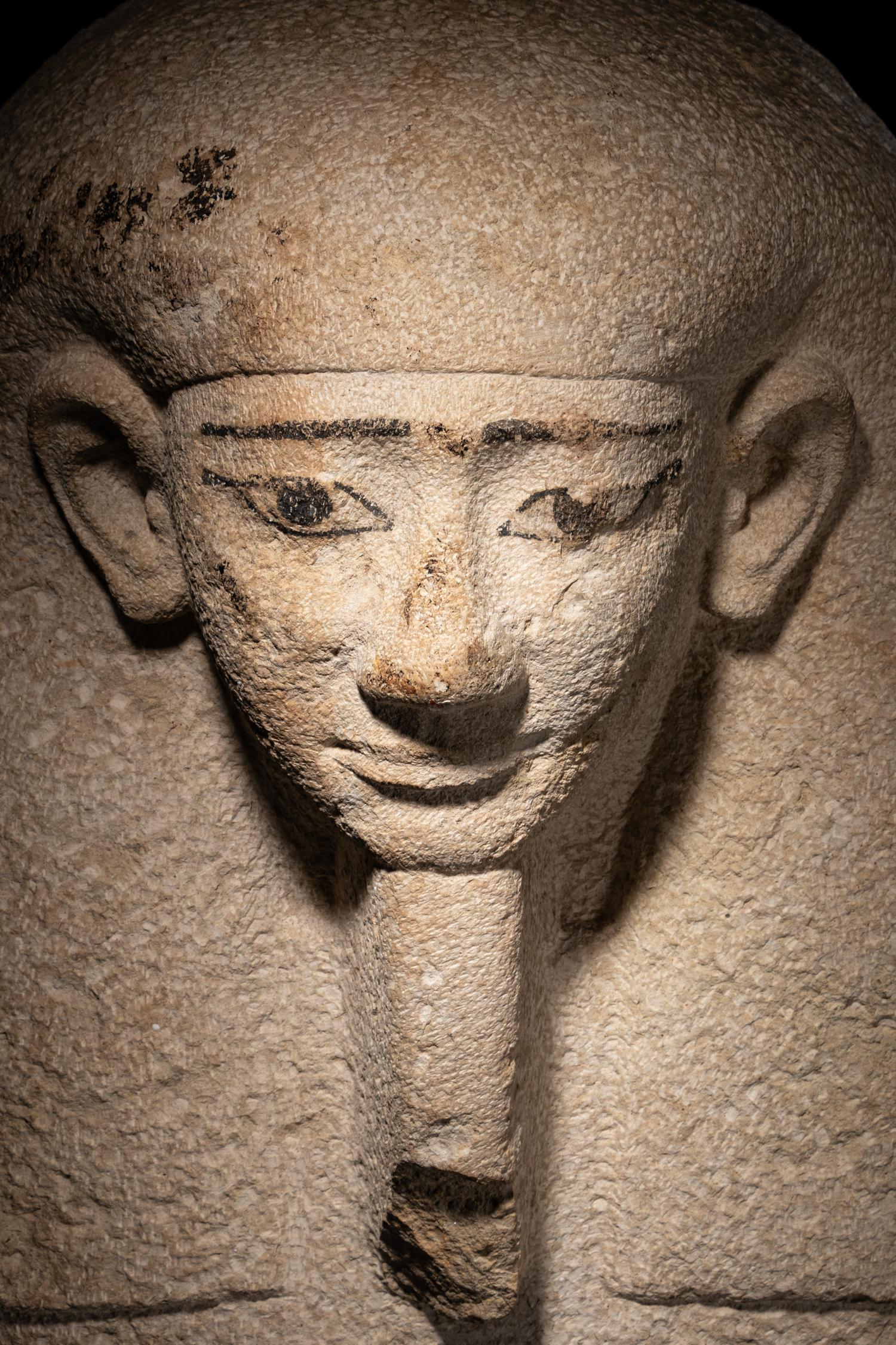 An Egyptian Limestone Sarcophagus Lid